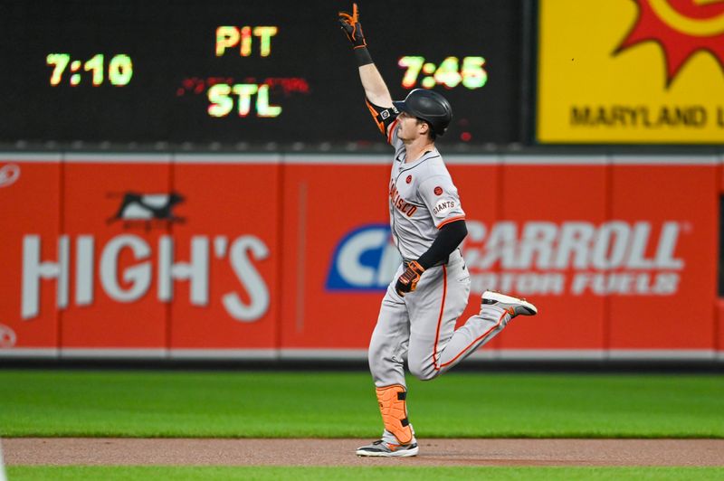 Sep 18, 2024; Baltimore, Maryland, USA;  San Francisco Giants outfielder Mike Yastrzemski (5) waves after hitting a lead off home run against the Baltimore Orioles at Oriole Park at Camden Yards. Mandatory Credit: Tommy Gilligan-Imagn Images