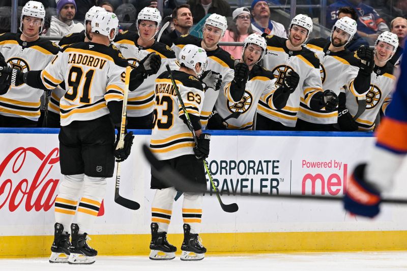 Nov 27, 2024; Elmont, New York, USA;  Boston Bruins left wing Brad Marchand (63) celebrates his goal against the New York Islanders during the first period at UBS Arena. Mandatory Credit: Dennis Schneidler-Imagn Images