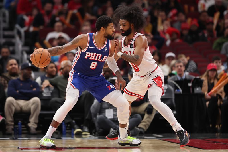 CHICAGO, ILLINOIS - DECEMBER 08: Paul George #8 of the Philadelphia 76ers is defended by Coby White #0 of the Chicago Bulls during the second half at the United Center on December 08, 2024 in Chicago, Illinois. NOTE TO USER: User expressly acknowledges and agrees that, by downloading and or using this photograph, User is consenting to the terms and conditions of the Getty Images License Agreement.  (Photo by Michael Reaves/Getty Images)