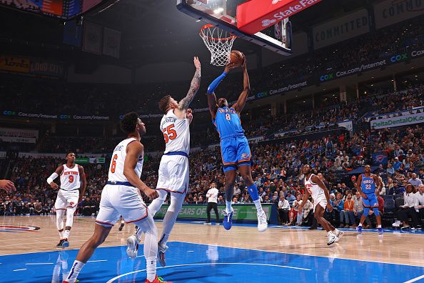 OKLAHOMA CITY, OK - DECEMBER 27: Jalen Williams #8 of the Oklahoma City Thunder shoots the ball during the game against the New York Knicks on December 27, 2023 at Paycom Arena in Oklahoma City, Oklahoma. NOTE TO USER: User expressly acknowledges and agrees that, by downloading and or using this photograph, User is consenting to the terms and conditions of the Getty Images License Agreement. Mandatory Copyright Notice: Copyright 2023 NBAE (Photo by Zach Beeker/NBAE via Getty Images)