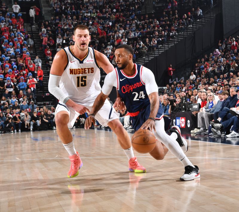 INGLEWOOD, CA - APRIL 26:  Norman Powell #24 of the LA Clippers dribbles the ball during Round One, Game Four of the 2025 NBA Playoffs on April 26, 2025 at Intuit Dome in Los Angeles, California. NOTE TO USER: User expressly acknowledges and agrees that, by downloading and/or using this Photograph, user is consenting to the terms and conditions of the Getty Images License Agreement. Mandatory Copyright Notice: Copyright 2025 NBAE (Photo by Juan Ocampo/NBAE via Getty Images)