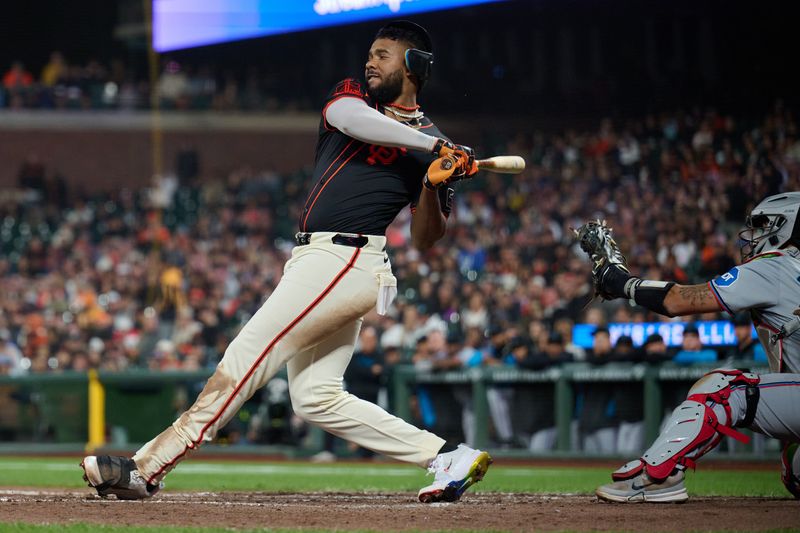 Aug 31, 2024; San Francisco, California, USA; San Francisco Giants outfielder Jerar Encarnacion (59) strikes out against the Miami Marlins during the ninth inning at Oracle Park. Mandatory Credit: Robert Edwards-USA TODAY Sports