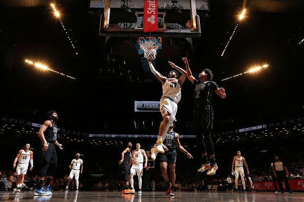 BROOKLYN, NY - DECEMBER 22: Jamal Murray #27 of the Denver Nuggets goes to the basket during the game on December 22, 2023 at Barclays Center in Brooklyn, New York. NOTE TO USER: User expressly acknowledges and agrees that, by downloading and or using this Photograph, user is consenting to the terms and conditions of the Getty Images License Agreement. Mandatory Copyright Notice: Copyright 2023 NBAE (Photo by Nathaniel S. Butler/NBAE via Getty Images)