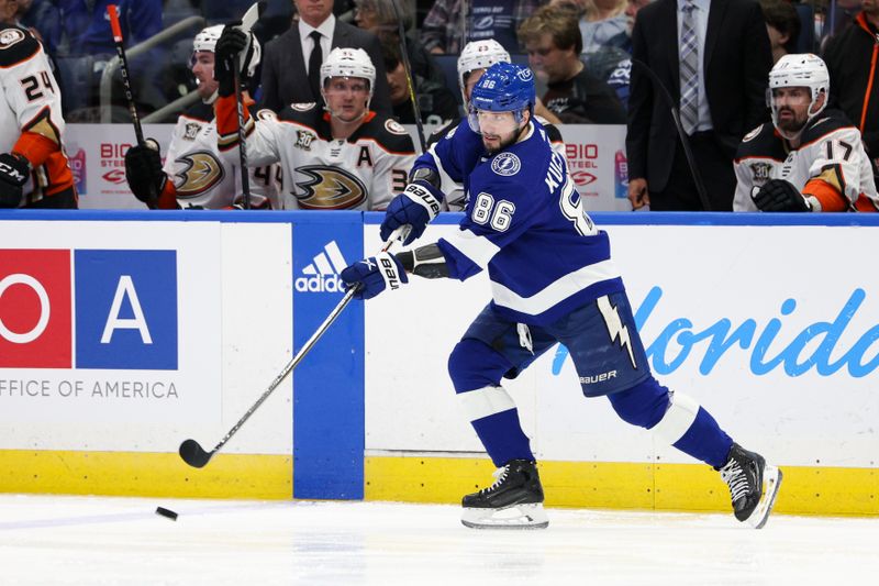 Jan 13, 2024; Tampa, Florida, USA;  Tampa Bay Lightning right wing Nikita Kucherov (86) passes the puck against the against the Anaheim Ducks in the second period at Amalie Arena. Mandatory Credit: Nathan Ray Seebeck-USA TODAY Sports