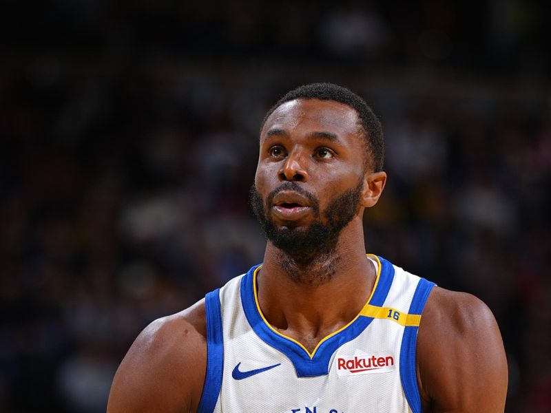 DENVER, CO - DECEMBER 3: Andrew Wiggins #22 of the Golden State Warriors shoots a free throw during the game against the Denver Nuggets during the Emirates NBA Cup on December 3, 2024 at Ball Arena in Denver, Colorado. NOTE TO USER: User expressly acknowledges and agrees that, by downloading and/or using this Photograph, user is consenting to the terms and conditions of the Getty Images License Agreement. Mandatory Copyright Notice: Copyright 2024 NBAE (Photo by Garrett Ellwood/NBAE via Getty Images)