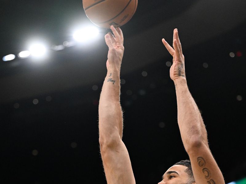 BOSTON, MASSACHUSETTS - MARCH 01: Jayson Tatum #0 of the Boston Celtics takes a shot before a game against the Dallas Mavericks at the TD Garden on March 01, 2024 in Boston, Massachusetts. NOTE TO USER: User expressly acknowledges and agrees that, by downloading and or using this photograph, User is consenting to the terms and conditions of the Getty Images License Agreement. (Photo by Brian Fluharty/Getty Images)