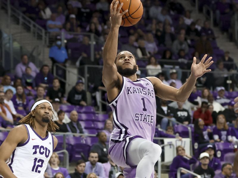 Jan 14, 2023; Fort Worth, Texas, USA;  Kansas State Wildcats guard Markquis Nowell (1) shoots past TCU Horned Frogs forward Xavier Cork (12) during the second half at Ed and Rae Schollmaier Arena. Mandatory Credit: Kevin Jairaj-USA TODAY Sports