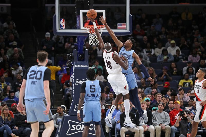 MEMPHIS, TENNESSEE - MARCH 02: Duop Reath #26 of the Portland Trail Blazers goes to the basket against GG Jackson #45 of the Memphis Grizzlies during the first half at FedExForum on March 02, 2024 in Memphis, Tennessee. NOTE TO USER: User expressly acknowledges and agrees that, by downloading and or using this photograph, User is consenting to the terms and conditions of the Getty Images License Agreement. (Photo by Justin Ford/Getty Images)