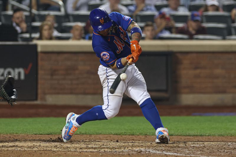 Jun 29, 2023; New York City, New York, USA; New York Mets catcher Francisco Alvarez (4) singles during the ninth inning against the Milwaukee Brewers at Citi Field. Mandatory Credit: Vincent Carchietta-USA TODAY Sports