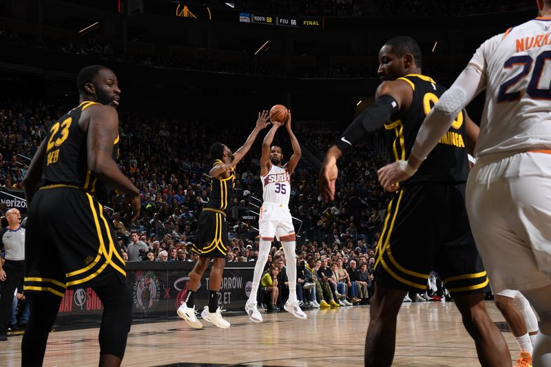 SAN FRANCISCO, CA - FEBRUARY 10: Kevin Durant #35 of the Phoenix Suns shoots a three point basket against the Golden State Warriors on February 10, 2024 at Chase Center in San Francisco, California. NOTE TO USER: User expressly acknowledges and agrees that, by downloading and or using this photograph, user is consenting to the terms and conditions of Getty Images License Agreement. Mandatory Copyright Notice: Copyright 2024 NBAE (Photo by Noah Graham/NBAE via Getty Images)