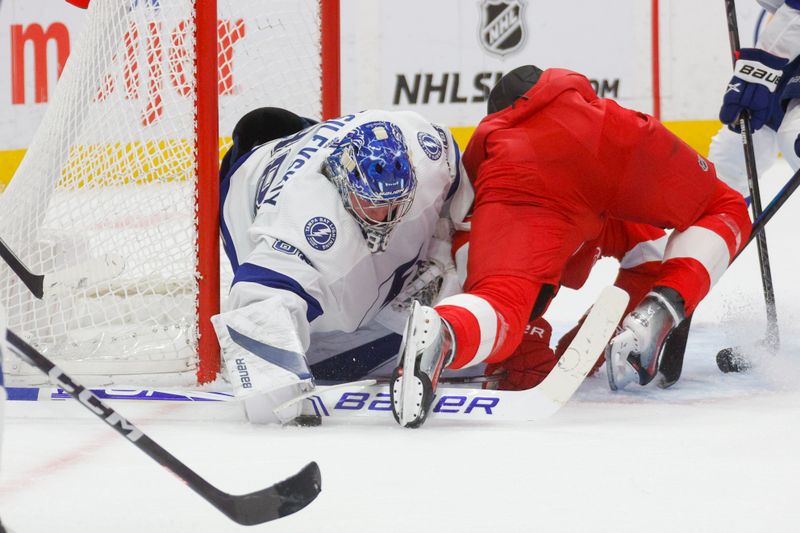 Jan 21, 2024; Detroit, Michigan, USA; Tampa Bay Lightning goaltender Andrei Vasilevskiy (88) blocks a shot during the second period against the Detroit Red Wings at Little Caesars Arena. Mandatory Credit: Brian Bradshaw Sevald-USA TODAY Sports