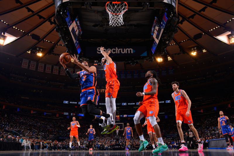 NEW YORK, NY - MARCH 31: Josh Hart #3 of the New York Knicks drives to the basket during the game against the Oklahoma City Thunder on March 31, 2024 at Madison Square Garden in New York City, New York.  NOTE TO USER: User expressly acknowledges and agrees that, by downloading and or using this photograph, User is consenting to the terms and conditions of the Getty Images License Agreement. Mandatory Copyright Notice: Copyright 2024 NBAE  (Photo by Jesse D. Garrabrant/NBAE via Getty Images)