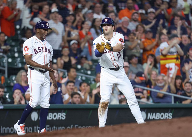 Jul 10, 2024; Houston, Texas, USA; Houston Astros right fielder Joey Loperfido (10) reacts after hitting a triple during the fourth inning against the Miami Marlins at Minute Maid Park. Mandatory Credit: Troy Taormina-USA TODAY Sports