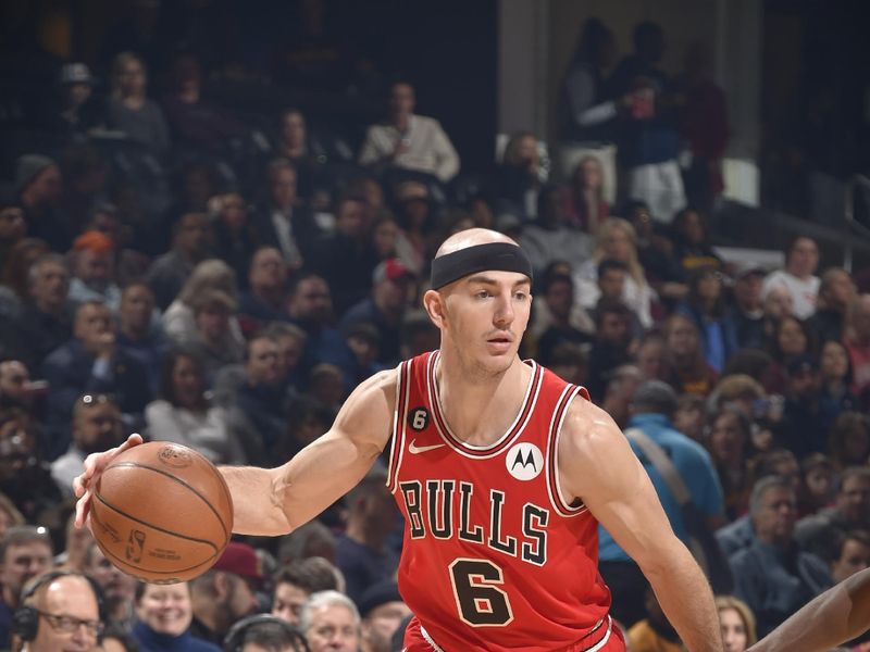 CLEVELAND, OH - FEBRUARY 11: Alex Caruso #6 of the Chicago Bulls dribbles the ball during the game against the Cleveland Cavaliers on February 11, 2023 at Rocket Mortgage FieldHouse in Cleveland, Ohio. NOTE TO USER: User expressly acknowledges and agrees that, by downloading and/or using this Photograph, user is consenting to the terms and conditions of the Getty Images License Agreement. Mandatory Copyright Notice: Copyright 2023 NBAE (Photo by David Liam Kyle/NBAE via Getty Images)