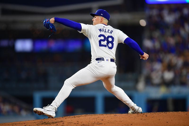 Aug 29, 2024; Los Angeles, California, USA; Los Angeles Dodgers pitcher Bobby Miller (28) throws against the Baltimore Orioles during the first inning at Dodger Stadium. Mandatory Credit: Gary A. Vasquez-USA TODAY Sports