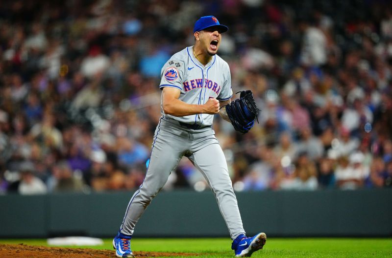 Aug 7, 2024; Denver, Colorado, USA; New York Mets pitcher Jose Butto (70) reacts after a strikeout in the seventh inning against the Colorado Rockies at Coors Field. Mandatory Credit: Ron Chenoy-USA TODAY Sports