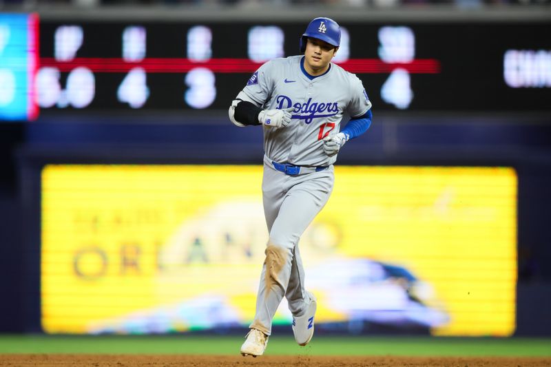 Sep 19, 2024; Miami, Florida, USA; Los Angeles Dodgers designated hitter Shohei Ohtani (17) circles the bases after hitting a two-run home run against the Miami Marlins during the sixth inning at loanDepot Park. Mandatory Credit: Sam Navarro-Imagn Images