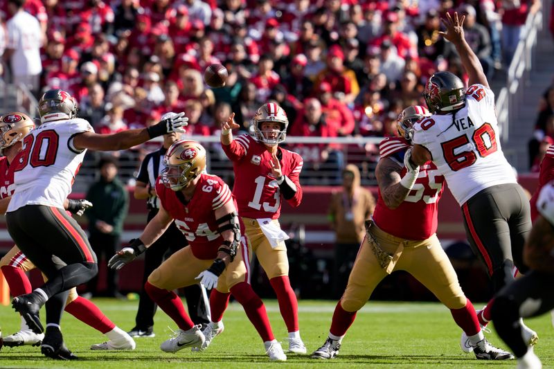 San Francisco 49ers quarterback Brock Purdy (13) passes during the first half of an NFL football game against the Tampa Bay Buccaneers on Sunday, Nov. 19, 2023, in Santa Clara, Calif. (AP Photo/Godofredo A. Vásquez)