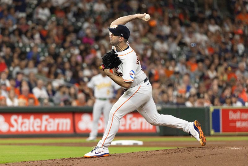 Sep 12, 2023; Houston, Texas, USA;Houston Astros starting pitcher Justin Verlander (35) pitches against the Oakland Athletics in the second inning at Minute Maid Park. Mandatory Credit: Thomas Shea-USA TODAY Sports