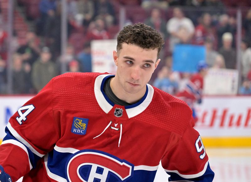 Apr 16, 2024; Montreal, Quebec, CAN; Montreal Canadiens defenseman Logan Mailloux (94) skates during the warmup period before the game against the Detroit Red Wings at the Bell Centre. Mandatory Credit: Eric Bolte-USA TODAY Sports