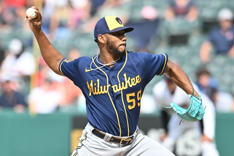 Jun 25, 2023; Cleveland, Ohio, USA; Milwaukee Brewers relief pitcher Elvis Peguero (59) throws a pitch during the tenth inning against the Cleveland Guardians at Progressive Field. Mandatory Credit: Ken Blaze-USA TODAY Sports