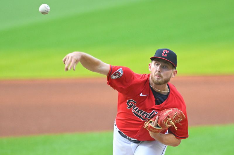 Aug 19, 2023; Cleveland, Ohio, USA; Cleveland Guardians starting pitcher Tanner Bibee (61) delivers a pitch in the first inning against the Detroit Tigers at Progressive Field. Mandatory Credit: David Richard-USA TODAY Sports