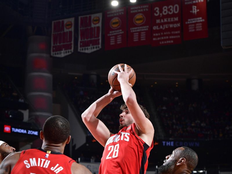 HOUSTON, TX - JANUARY 29:  Alperen Sengun #28 of the Houston Rockets looks to pass the ball during the game against the Los Angeles Lakers on January 29, 2024 at the Toyota Center in Houston, Texas. NOTE TO USER: User expressly acknowledges and agrees that, by downloading and or using this photograph, User is consenting to the terms and conditions of the Getty Images License Agreement. Mandatory Copyright Notice: Copyright 2024 NBAE (Photo by Logan Riely/NBAE via Getty Images)