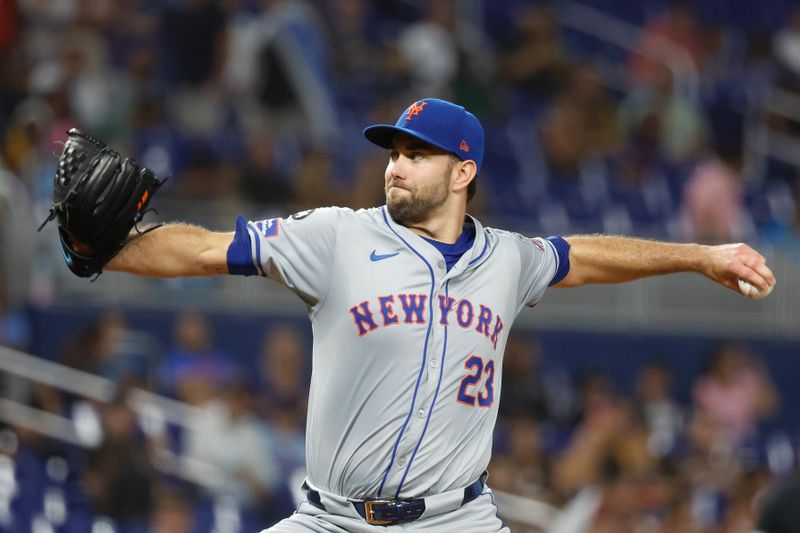 Jul 22, 2024; Miami, Florida, USA;  New York Mets starting pitcher David Peterson (23) pitches against the Miami Marlins in the second inning at loanDepot Park. Mandatory Credit: Rhona Wise-USA TODAY Sports