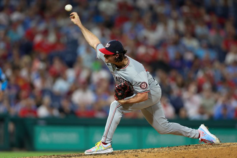 Aug 16, 2024; Philadelphia, Pennsylvania, USA; Washington Nationals pitcher Kyle Finnegan (67) throws a pitch during the ninth inning against the Philadelphia Phillies at Citizens Bank Park. Mandatory Credit: Bill Streicher-USA TODAY Sports