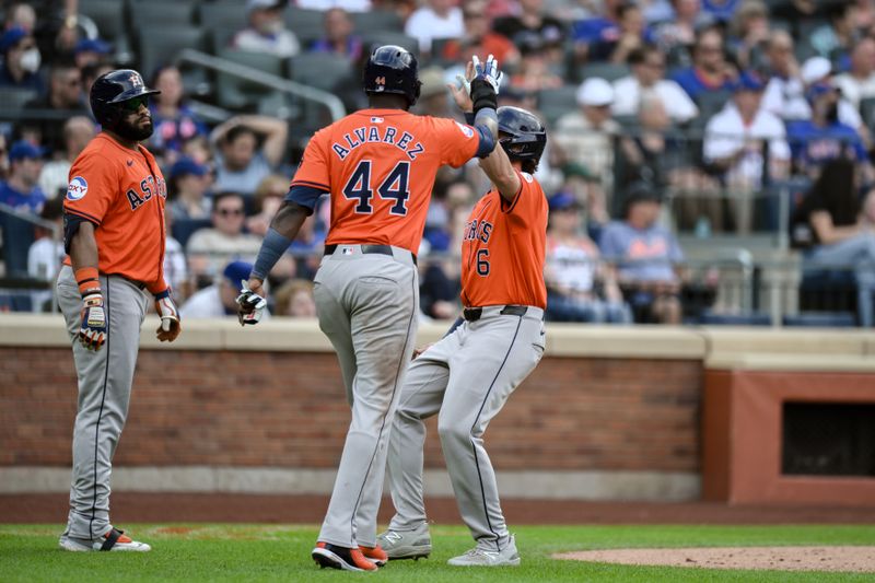 Jun 29, 2024; New York City, New York, USA; Houston Astros outfielder Jake Meyers (6) and Houston Astros outfielder Yordan Alvarez (44) score on a two RBI double by Houston Astros shortstop Jeremy Peña (not pictured) during the fourth inning against the New York Mets at Citi Field. Mandatory Credit: John Jones-USA TODAY Sports