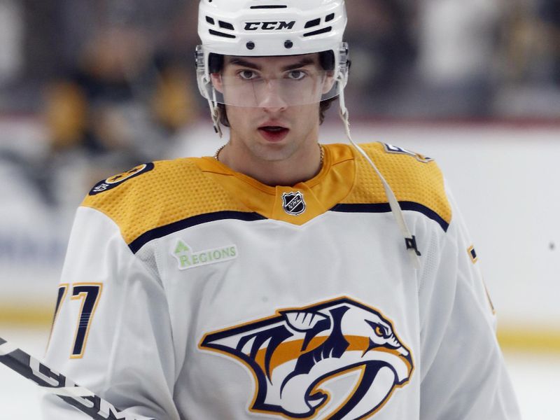 Apr 15, 2024; Pittsburgh, Pennsylvania, USA; Nashville Predators right wing Luke Evangelista (77) warms up before the game against he Pittsburgh Penguins at PPG Paints Arena. Mandatory Credit: Charles LeClaire-USA TODAY Sports