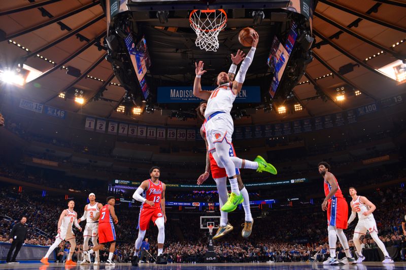 NEW YORK, NY - APRIL 20: Jalen Brunson #11 of the New York Knicks drives to the basket during the game against the Philadelphia 76ers during Round 1 Game 1 of the 2024 NBA Playoffs on April 20, 2024 at Madison Square Garden in New York City, New York.  NOTE TO USER: User expressly acknowledges and agrees that, by downloading and or using this photograph, User is consenting to the terms and conditions of the Getty Images License Agreement. Mandatory Copyright Notice: Copyright 2024 NBAE  (Photo Jesse D. Garrabrant/NBAE via Getty Images)