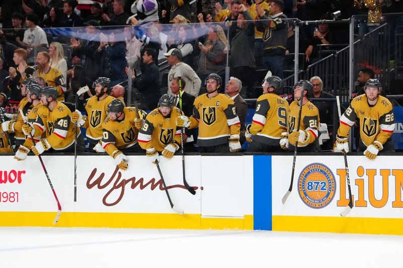 Oct 22, 2024; Las Vegas, Nevada, USA; Vegas Golden Knights players tap their sticks after killing off a Los Angeles Kings powerplay during the second period at T-Mobile Arena. Mandatory Credit: Stephen R. Sylvanie-Imagn Images