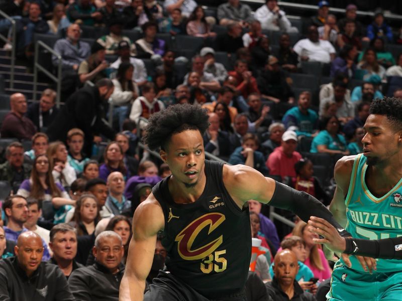 CHARLOTTE, NC - MARCH 27: Isaac Okoro #35 of the Cleveland Cavaliers goes to the basket during the game on March 27, 2024 at Spectrum Center in Charlotte, North Carolina. NOTE TO USER: User expressly acknowledges and agrees that, by downloading and or using this photograph, User is consenting to the terms and conditions of the Getty Images License Agreement. Mandatory Copyright Notice: Copyright 2024 NBAE (Photo by Kent Smith/NBAE via Getty Images)