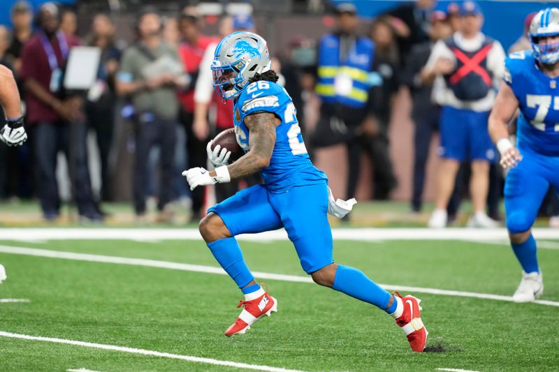 Detroit Lions running back Jahmyr Gibbs (26) runs for yardage against the Chicago Bears during the first half of an NFL football game, Sunday, Nov. 17, 2024, in Detroit. (AP Photo/Carlos Osorio)