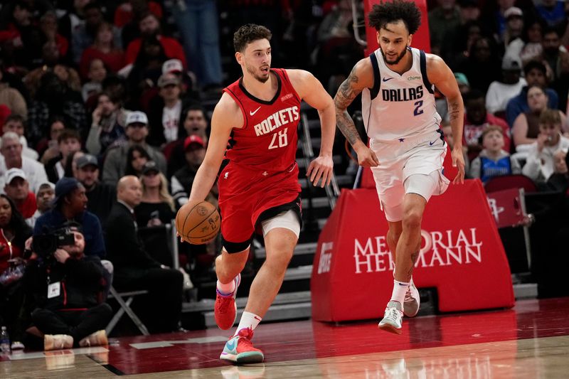 HOUSTON, TX - JANUARY 1:  Alperen Sengun #28 of the Houston Rockets dribbles the ball during the game against the Dallas Mavericks on January 1, 2025 at the Toyota Center in Houston, Texas. NOTE TO USER: User expressly acknowledges and agrees that, by downloading and or using this photograph, User is consenting to the terms and conditions of the Getty Images License Agreement. Mandatory Copyright Notice: Copyright 2025 NBAE (Photo by Kevin M. Cox/NBAE via Getty Images)