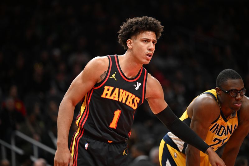 ATLANTA, GEORGIA - JANUARY 12: Jalen Johnson #1 of the Atlanta Hawks looks on during the game against the Indiana Pacers on January 12, 2024 at State Farm Arena in Atlanta, Georgia.  NOTE TO USER: User expressly acknowledges and agrees that, by downloading and or using this photograph, User is consenting to the terms and conditions of the Getty Images License Agreement. (Photo by Paras Griffin/Getty Images)