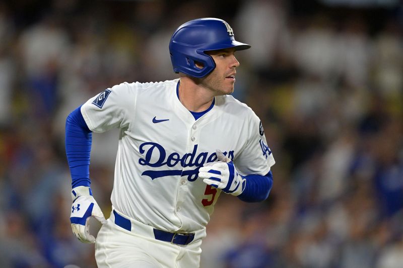 Sep 17, 2025; Los Angeles, California, USA; Los Angeles Dodgers first base Freddie Freeman (5) rounds the bases after a home run against the Philadelphia Phillies in the second inning at Dodger Stadium. Mandatory Credit: Jayne Kamin-Oncea-Imagn Images