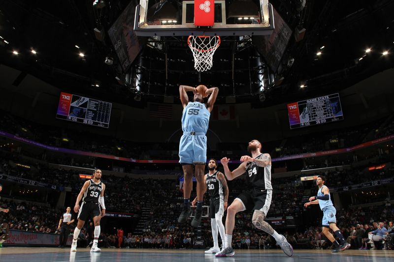 MEMPHIS, TN - APRIL 9: Trey Jemison #55 of the Memphis Grizzlies drives to the basket during the game against the San Antonio Spurs on April 9, 2024 at FedExForum in Memphis, Tennessee. NOTE TO USER: User expressly acknowledges and agrees that, by downloading and or using this photograph, User is consenting to the terms and conditions of the Getty Images License Agreement. Mandatory Copyright Notice: Copyright 2024 NBAE (Photo by Joe Murphy/NBAE via Getty Images)