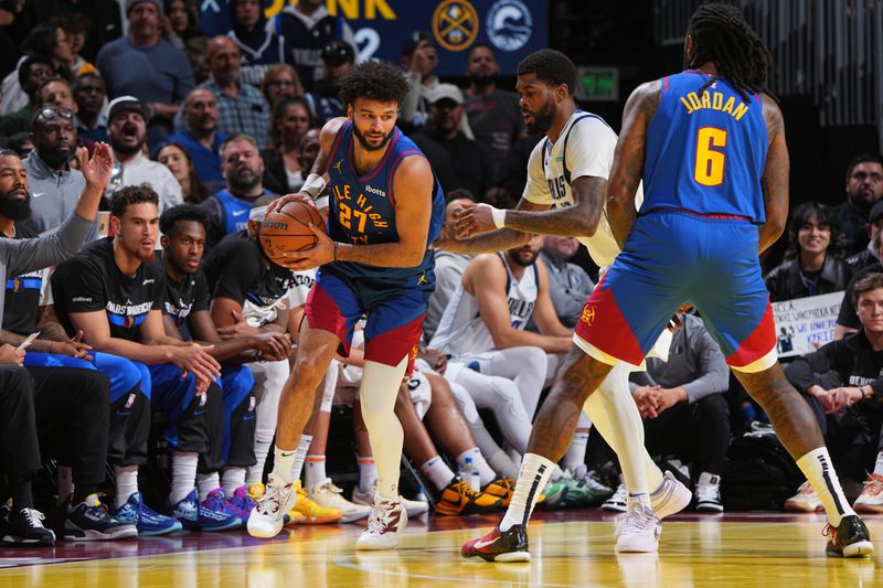 DENVER, CO - NOVEMBER 22: Jamal Murray #27 of the Denver Nuggets looks to pass the ball during the game against the Dallas Mavericks during the Emirates NBA Cup game on November 22, 2024 at Ball Arena in Denver, Colorado. NOTE TO USER: User expressly acknowledges and agrees that, by downloading and/or using this Photograph, user is consenting to the terms and conditions of the Getty Images License Agreement. Mandatory Copyright Notice: Copyright 2024 NBAE (Photo by Garrett Ellwood/NBAE via Getty Images)