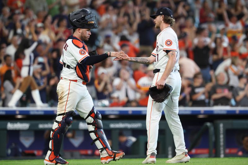 May 24, 2025; Houston, Texas, USA; Houston Astros catcher Victor Caratini (17) celebrates with relief pitcher Josh Hader (71) after the game against the Seattle Mariners at Daikin Park. Mandatory Credit: Troy Taormina-Imagn Images