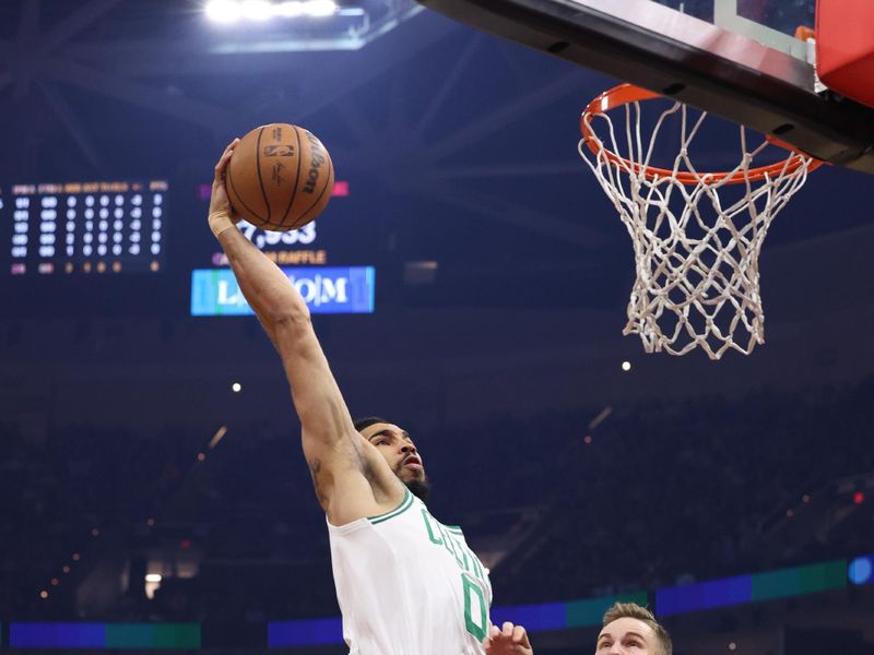 CLEVELAND, OH - MARCH 5: Jayson Tatum #0 of the Boston Celtics dunks the ball during the game against the Cleveland Cavaliers on March 5, 2024 at Rocket Mortgage FieldHouse in Cleveland, Ohio. NOTE TO USER: User expressly acknowledges and agrees that, by downloading and/or using this Photograph, user is consenting to the terms and conditions of the Getty Images License Agreement. Mandatory Copyright Notice: Copyright 2024 NBAE (Photo by Lauren Leigh Bacho /NBAE via Getty Images)