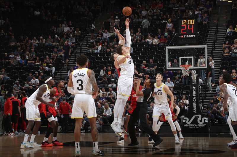 SALT LAKE CITY, UT - OCTOBER 7: Alperen Sengun #28 of the Houston Rockets and Walker Kessler #24 of the Utah Jazz go up for the opening tip off during a NBA preseason game on October 7, 2024 at the Delta Center in Salt Lake City, Utah. NOTE TO USER: User expressly acknowledges and agrees that, by downloading and or using this Photograph, User is consenting to the terms and conditions of the Getty Images License Agreement. Mandatory Copyright Notice: Copyright 2024 NBAE (Photo by Melissa Majchrzak/NBAE via Getty Images)