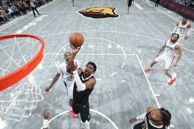 MEMPHIS, TN - FEBRUARY 23: GG Jackson #45 of the Memphis Grizzlies shoots the ball during the game against the LA Clippers on February 23, 2024 at FedExForum in Memphis, Tennessee. NOTE TO USER: User expressly acknowledges and agrees that, by downloading and or using this photograph, User is consenting to the terms and conditions of the Getty Images License Agreement. Mandatory Copyright Notice: Copyright 2024 NBAE (Photo by Joe Murphy/NBAE via Getty Images)