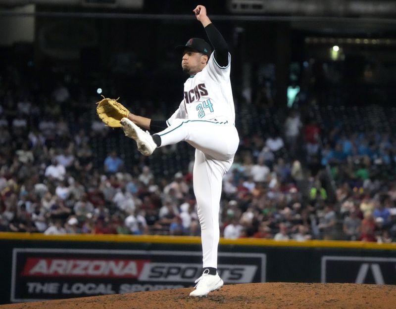 Jun 29, 2023; Phoenix, Arizona, USA; Arizona Diamondbacks relief pitcher Kyle Nelson (24) pitches against the Tampa Bay Rays at Chase Field. Mandatory Credit: Joe Rondone-USA TODAY Sports