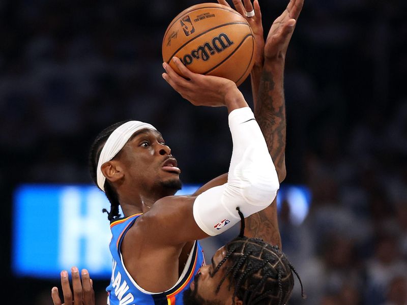 OKLAHOMA CITY, OKLAHOMA - APRIL 24:  Shai Gilgeous-Alexander #2 of the Oklahoma City Thunder shoots over Naji Marshall #8 of the New Orleans Pelicans during game two of the first round of the NBA playoffs at Paycom Center on April 24, 2024 in Oklahoma City, Oklahoma. (Photo by Jamie Squire/Getty Images)