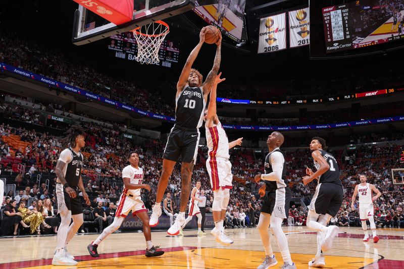 MIAMI, FL - OCTOBER 15: Jeremy Sochan #10 of the San Antonio Spurs dribbles the ball during the game against the Miami Heat during a NBA preseason game on October 15, 2024 at Kaseya Center in Miami, Florida. NOTE TO USER: User expressly acknowledges and agrees that, by downloading and or using this Photograph, user is consenting to the terms and conditions of the Getty Images License Agreement. Mandatory Copyright Notice: Copyright 2024 NBAE (Photo by Jesse D. Garrabrant/NBAE via Getty Images)