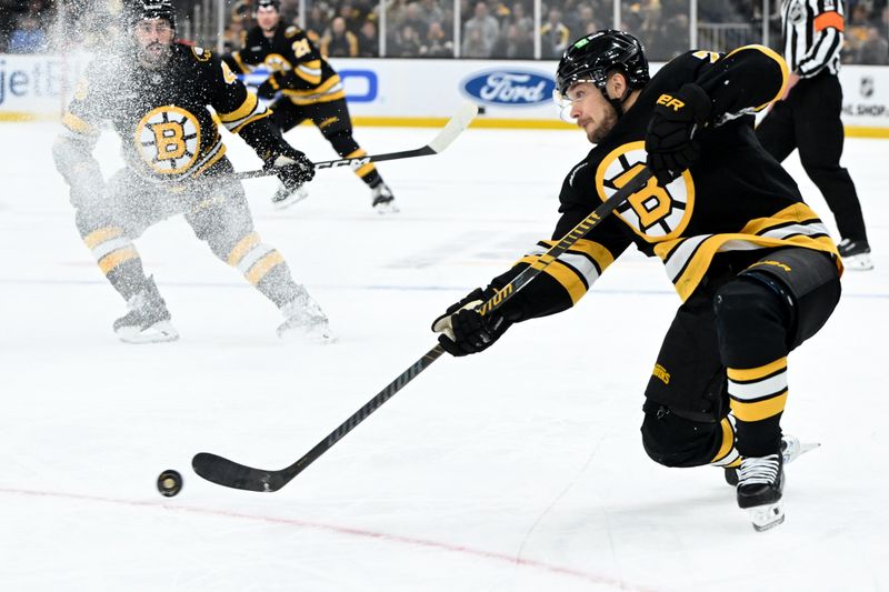 Nov 6, 2025; Boston, Massachusetts, USA; Boston Bruins left wing Viktor Arvidsson (71) attempts a shot against the Ottawa Senators during the first period at the TD Garden. Mandatory Credit: Brian Fluharty-Imagn Images