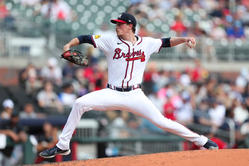 Aug 4, 2024; Cumberland, Georgia, USA; Atlanta Braves starting pitcher Max Fried (54) pitches in a game against the Miami Marlins in the fourth inning at Truist Park. Mandatory Credit: Mady Mertens-USA TODAY Sports