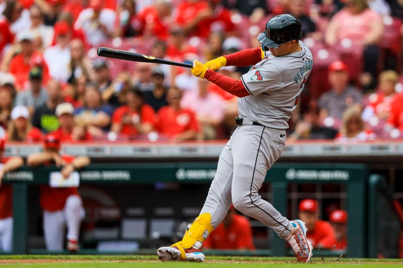 May 9, 2024; Cincinnati, Ohio, USA; Arizona Diamondbacks designated hitter Joc Pederson (3) hits a solo home run in the first inning against the Cincinnati Reds at Great American Ball Park. Mandatory Credit: Katie Stratman-USA TODAY Sports